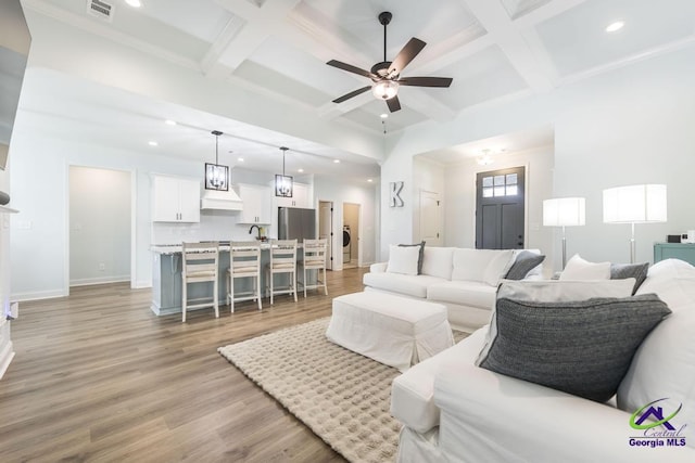 107 Field View Ln, Kathleen, GA 31047 - living area featuring recessed lighting, coffered ceiling, beam ceiling, ceiling fan, and light wood finished floors
