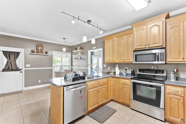 2725 Moseley Rd, Byron, GA 31008 - kitchen featuring appliances with stainless steel finishes, light brown cabinetry, light tile patterned floors, a sink, and a peninsula