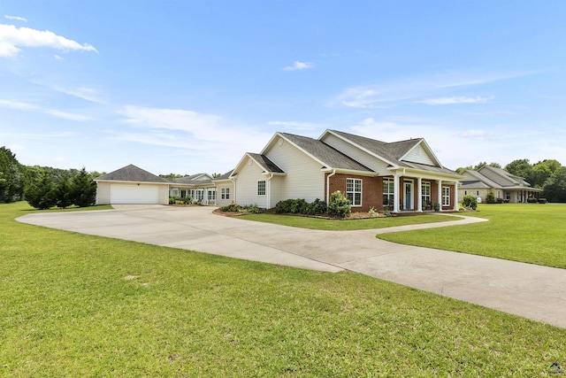 2725 Moseley Rd, Byron, GA 31008 - view of front of home featuring a front lawn, brick siding, driveway, and roof with shingles