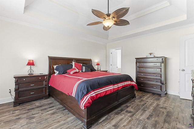 2725 Moseley Rd, Byron, GA 31008 - bedroom with a raised ceiling, wood finished floors, ornamental molding, baseboards, and ceiling fan
