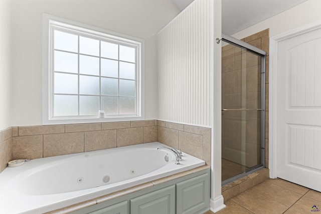 2725 Moseley Rd, Byron, GA 31008 - full bathroom featuring a shower stall, a whirlpool tub, and tile patterned floors