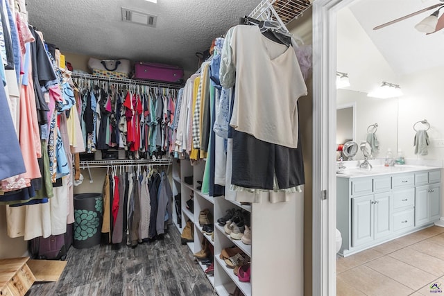 2725 Moseley Rd, Byron, GA 31008 - walk in closet featuring ceiling fan and light tile patterned flooring