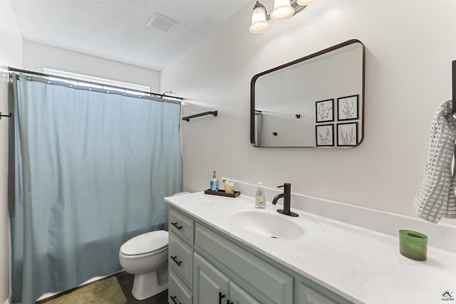 2725 Moseley Rd, Byron, GA 31008 - full bath featuring vanity, toilet, a textured ceiling, and shower / bath combination with curtain