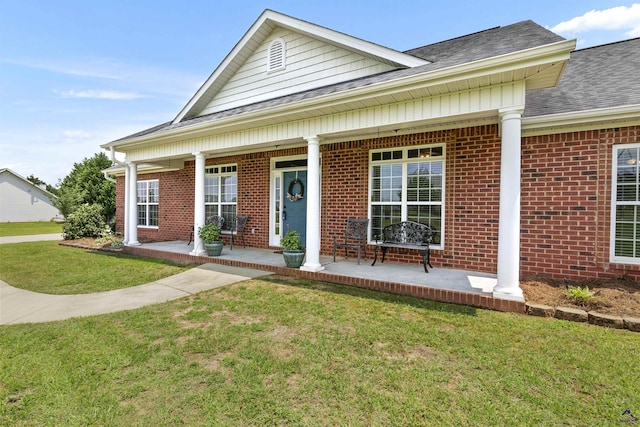 2725 Moseley Rd, Byron, GA 31008 - view of front of house featuring brick siding, a front yard, and roof with shingles