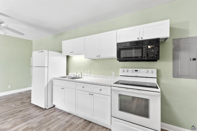 2725 Moseley Rd, Byron, GA 31008 - kitchen featuring white appliances, electric panel, ceiling fan, white cabinets, and a textured ceiling