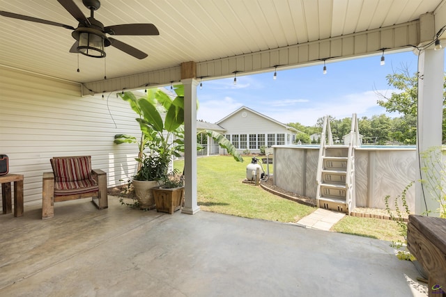 2725 Moseley Rd, Byron, GA 31008 - view of patio / terrace with ceiling fan and an outdoor pool