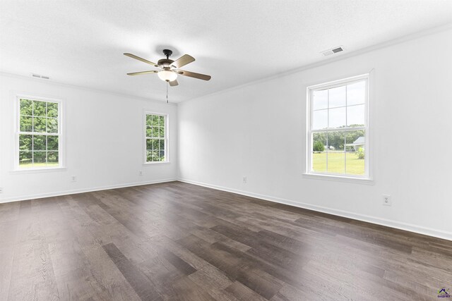 2725 Moseley Rd, Byron, GA 31008 - empty room featuring plenty of natural light, ceiling fan, dark wood-type flooring, and baseboards