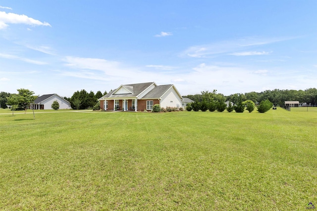 2725 Moseley Rd, Byron, GA 31008 - view of front of home with a front lawn and brick siding