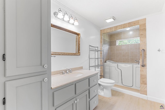 2725 Moseley Rd, Byron, GA 31008 - bathroom featuring vanity, a bath, toilet, wood finished floors, and a shower