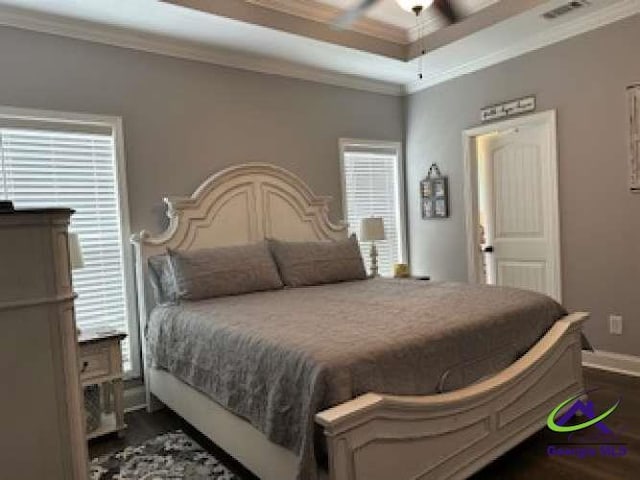 403 Hunts Landing Dr, Kathleen, GA 31047 - bedroom with crown molding, dark wood-style floors, baseboards, and coffered ceiling