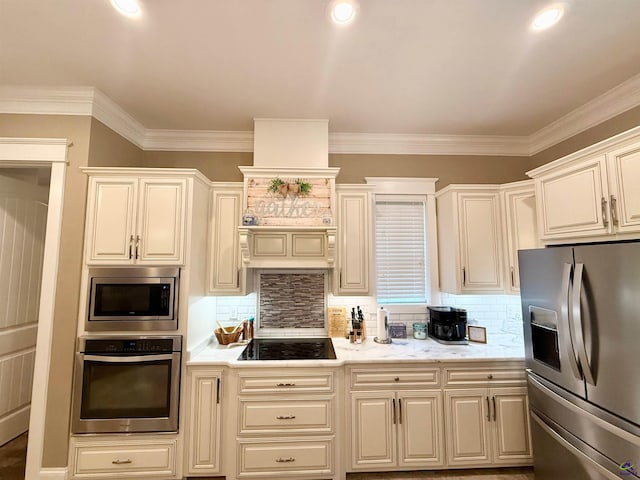 183 Terrell Rd, Elko, GA 31025 - kitchen with stainless steel appliances, light countertops, crown molding, tasteful backsplash, and recessed lighting