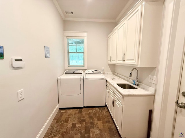 183 Terrell Rd, Elko, GA 31025 - laundry room with washer and dryer, cabinet space, ornamental molding, baseboards, and brick patterned flooring