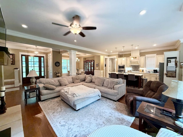 183 Terrell Rd, Elko, GA 31025 - living area with decorative columns, ceiling fan, dark wood-style floors, ornamental molding, and recessed lighting