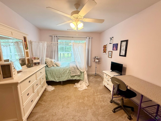 183 Terrell Rd, Elko, GA 31025 - bedroom featuring light colored carpet, an office area, and a ceiling fan