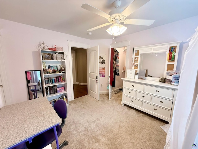 183 Terrell Rd, Elko, GA 31025 - home office featuring a ceiling fan, light carpet, and baseboards