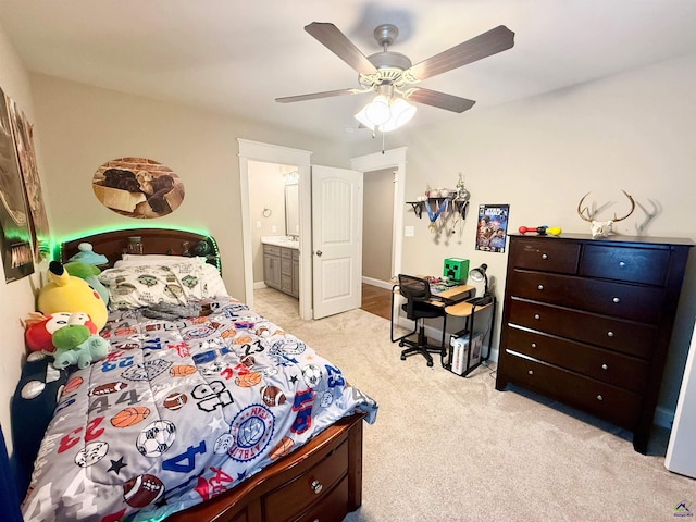 183 Terrell Rd, Elko, GA 31025 - bedroom featuring light colored carpet, ceiling fan, and ensuite bathroom