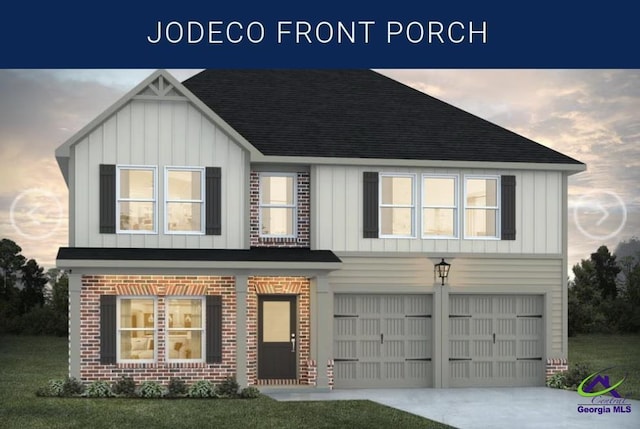 305 Cody Dr, Macon, GA 31216 - view of front of house with board and batten siding, a garage, driveway, brick siding, and roof with shingles