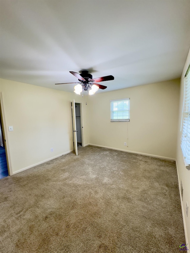 221 Fox Hound Dr, Byron, GA 31008 - carpeted spare room with a ceiling fan and baseboards