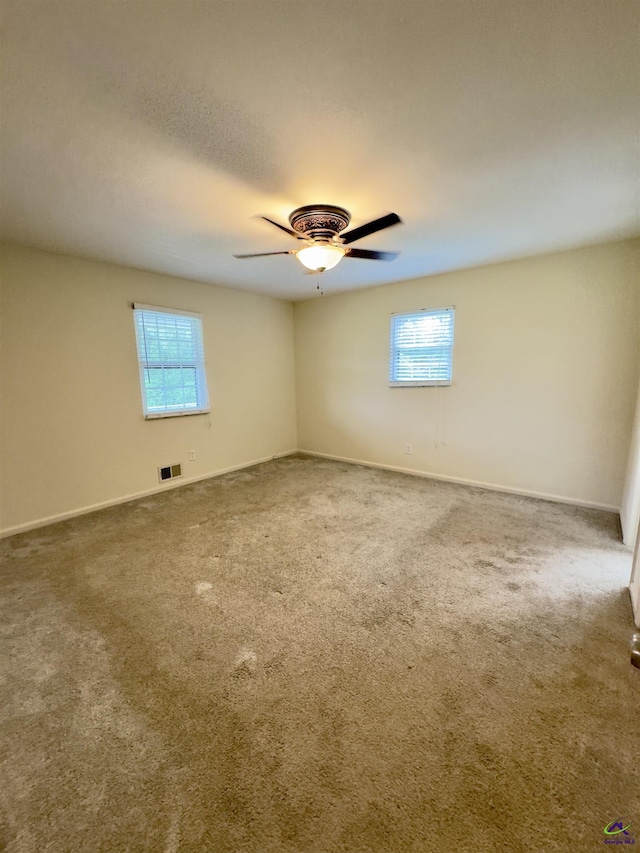 221 Fox Hound Dr, Byron, GA 31008 - empty room with carpet flooring, baseboards, and a ceiling fan