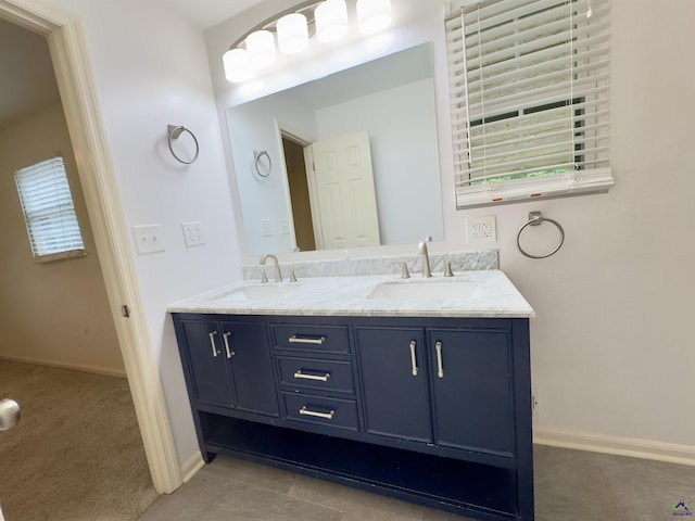 221 Fox Hound Dr, Byron, GA 31008 - bathroom with double vanity and baseboards