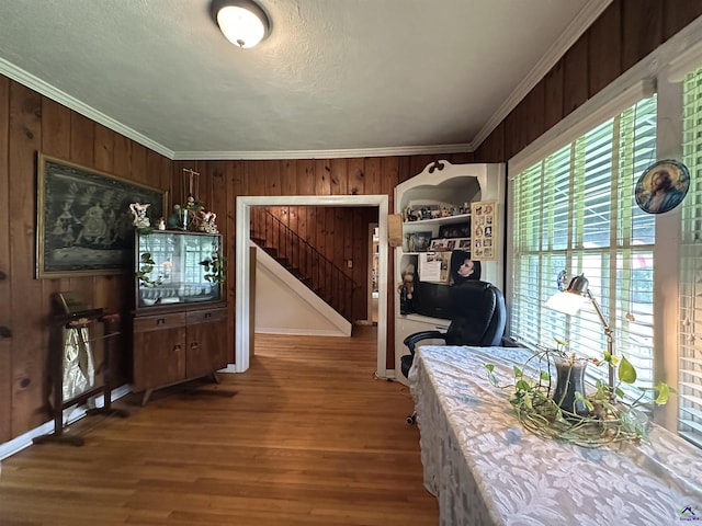 621 Forest Hill Rd, Macon, GA 31220 - dining space with wood walls, ornamental molding, and wood finished floors