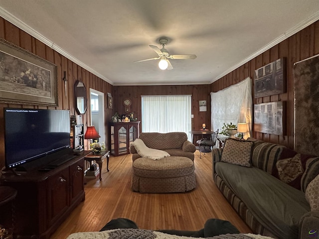 621 Forest Hill Rd, Macon, GA 31220 - living room with crown molding, a ceiling fan, wooden walls, and light wood-style flooring