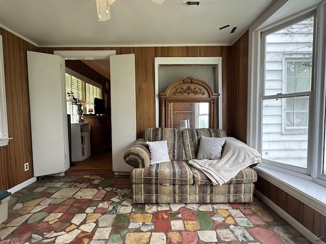 621 Forest Hill Rd, Macon, GA 31220 - living area featuring healthy amount of natural light, wood walls, and ornamental molding