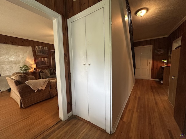 621 Forest Hill Rd, Macon, GA 31220 - hall with wood walls, wood finished floors, ornamental molding, and baseboards
