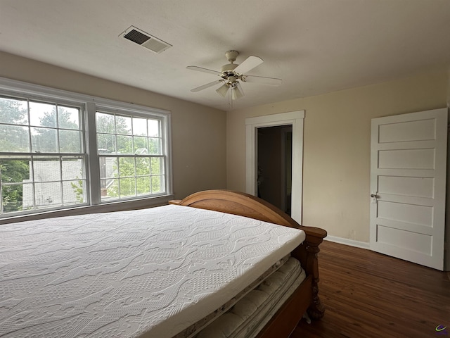 621 Forest Hill Rd, Macon, GA 31220 - bedroom featuring dark wood-style flooring, baseboards, and ceiling fan