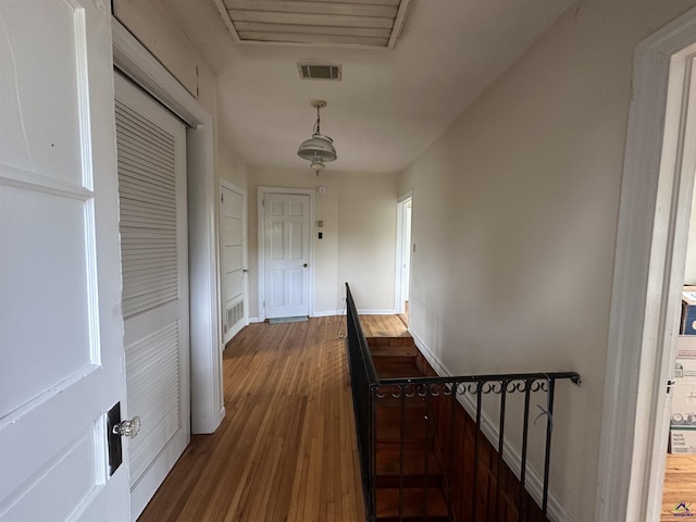 621 Forest Hill Rd, Macon, GA 31220 - hall featuring wood finished floors, an upstairs landing, and baseboards