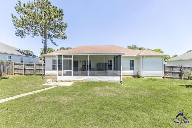 113 Castle Pines Dr, Bonaire, GA 31008 - rear view of house with a sunroom and roof with shingles
