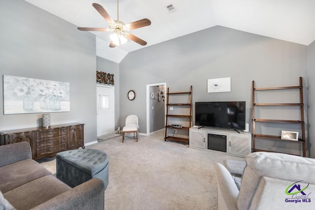 113 Castle Pines Dr, Bonaire, GA 31008 - living area featuring lofted ceiling, baseboards, ceiling fan, and light carpet