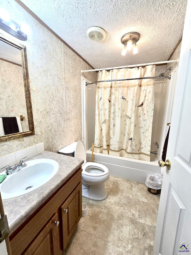 2019 Scharie Ln, Rentz, GA 31075 - bathroom featuring shower / tub combo, vanity, toilet, a textured ceiling, and ornamental molding