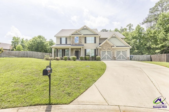 110 Pocono Ct, Bonaire, GA 31005 - view of front of home featuring driveway, stone siding, and a garage