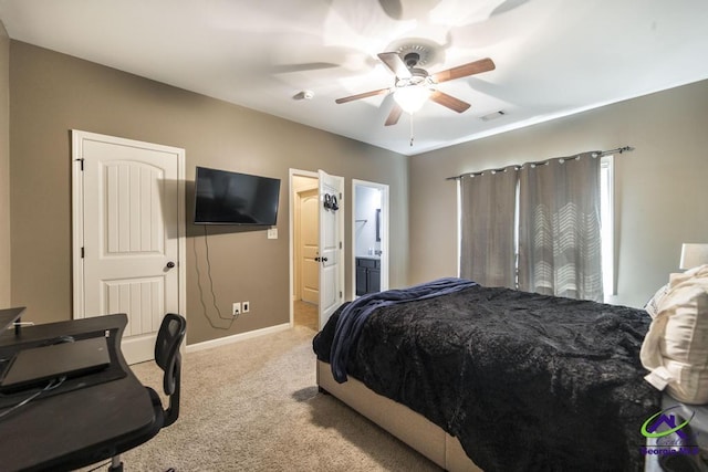 110 Pocono Ct, Bonaire, GA 31005 - carpeted bedroom featuring baseboards, a ceiling fan, and ensuite bath