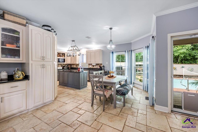 117 Richfield Cir, Kathleen, GA 31047 - dining space with stone tile flooring, ornamental molding, and a chandelier