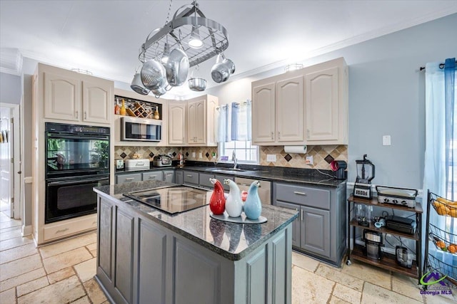 117 Richfield Cir, Kathleen, GA 31047 - kitchen with gray cabinetry, black appliances, crown molding, stone tile floors, and decorative backsplash
