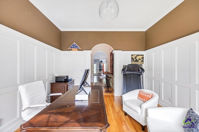117 Richfield Cir, Kathleen, GA 31047 - office with a decorative wall, arched walkways, crown molding, light wood-style flooring, and a wainscoted wall
