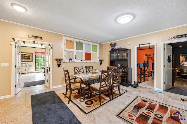 117 Richfield Cir, Kathleen, GA 31047 - dining area with crown molding, a textured ceiling, baseboards, and light tile patterned flooring