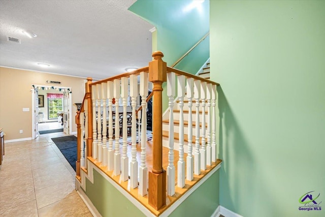 117 Richfield Cir, Kathleen, GA 31047 - stairs featuring baseboards, a textured ceiling, tile patterned floors, and ornamental molding