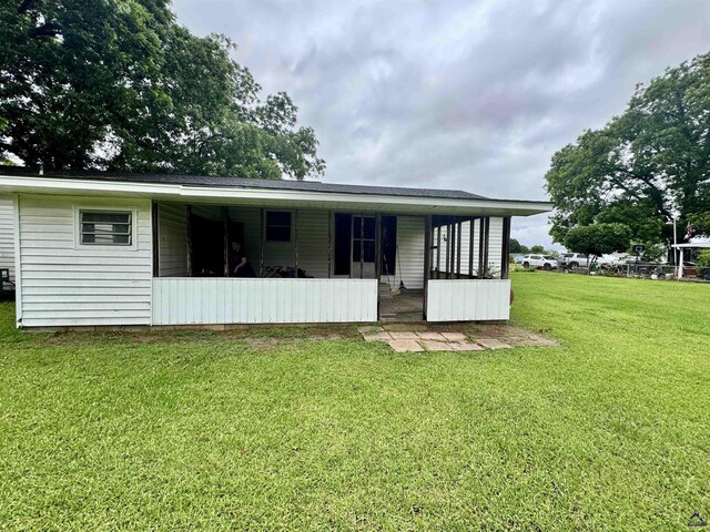 2204 Sheppard Rd, Cordele, GA 31015 - back of house featuring a yard and a porch