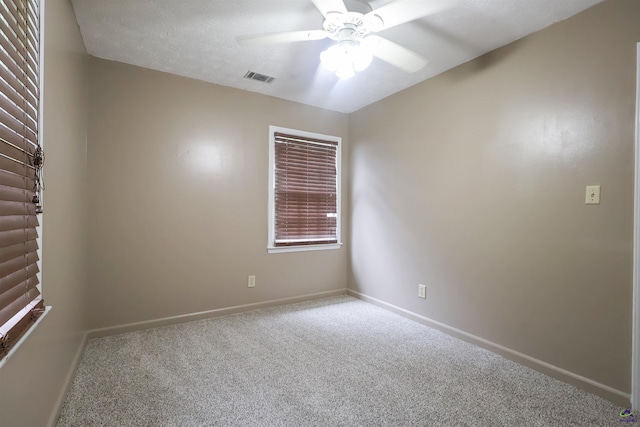 901 Ross St, Perry, GA 31069 - carpeted spare room with ceiling fan and baseboards