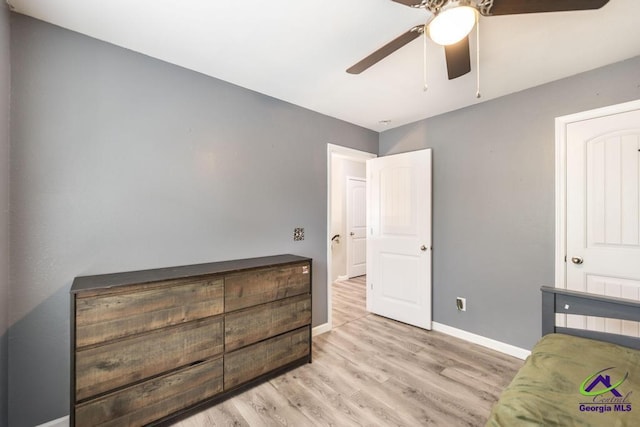 318 Flowing Meadows Dr, Bonaire, GA 31047 - bedroom with wood finished floors, baseboards, and a ceiling fan
