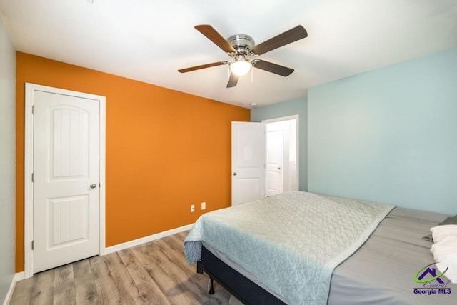 318 Flowing Meadows Dr, Bonaire, GA 31047 - bedroom featuring wood finished floors, baseboards, and ceiling fan