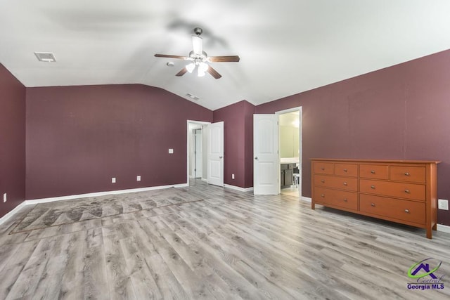 318 Flowing Meadows Dr, Bonaire, GA 31047 - unfurnished bedroom featuring lofted ceiling, wood finished floors, baseboards, and a ceiling fan