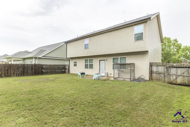 318 Flowing Meadows Dr, Bonaire, GA 31047 - rear view of house with central air condition unit