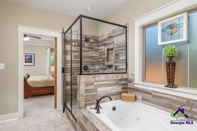 204 Bobtail Run, Kathleen, GA 31047 - bathroom with a shower stall, connected bathroom, a tub with jets, and baseboards