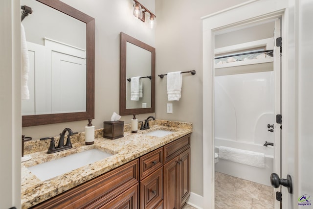 204 Bobtail Run, Kathleen, GA 31047 - bathroom with double vanity, toilet, and shower / bath combination