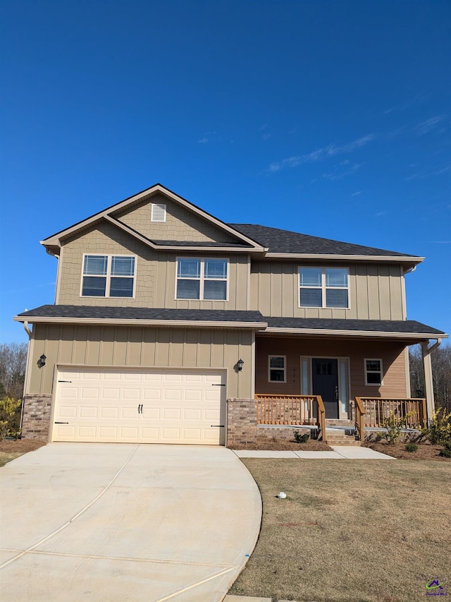 624 Britton Way, Macon, GA 31216 - view of front of house with an attached garage, driveway, a porch, and board and batten siding