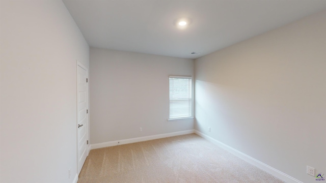 444 Southern Oaks Dr, Macon, GA 31216 - unfurnished room with baseboards and light carpet